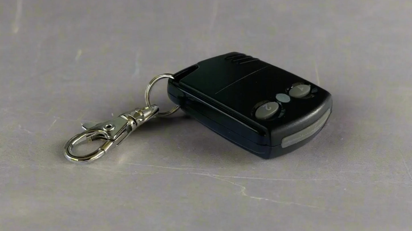 Close-up of the iKey Transmitter remote showing buttons and compact design