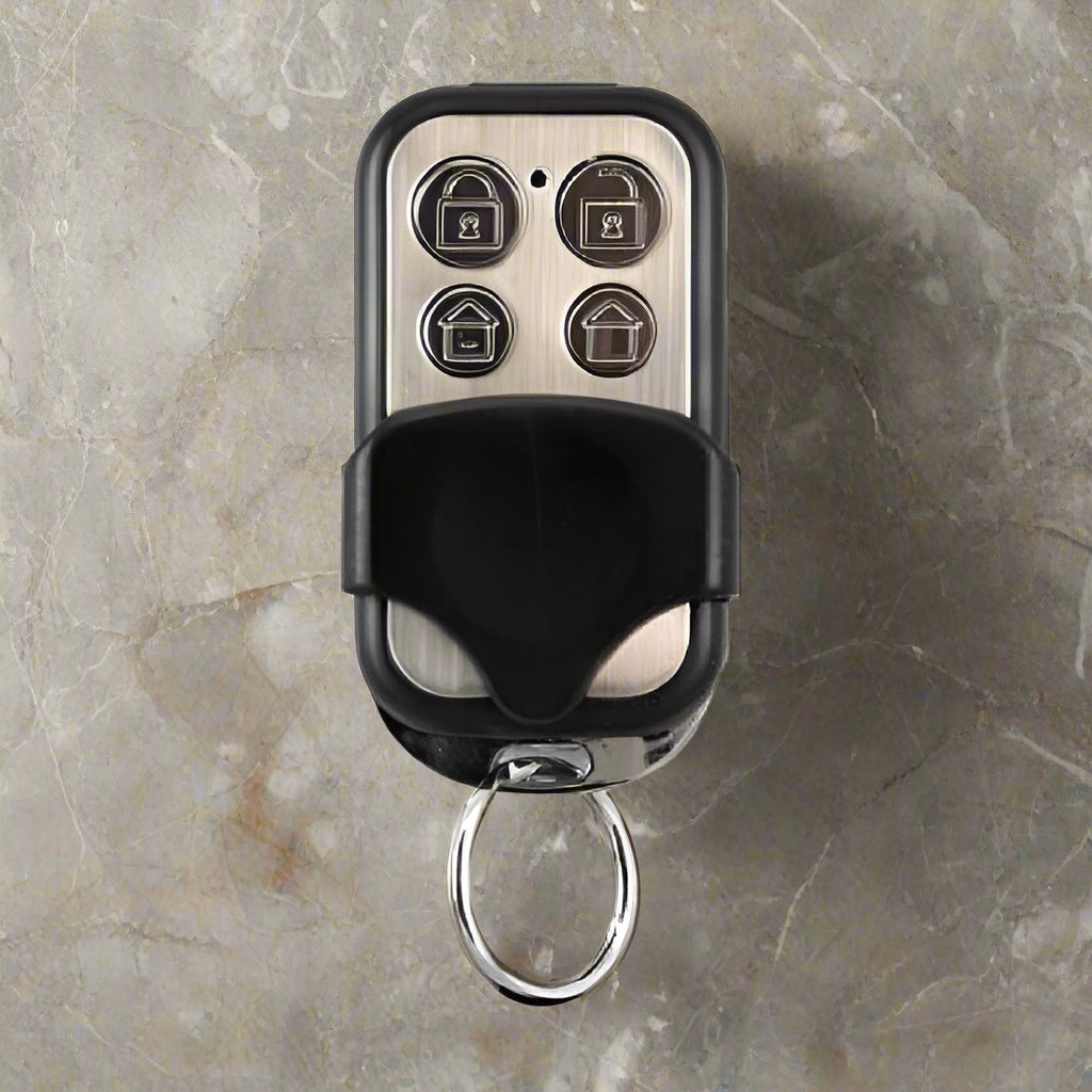 Front view of Activor RTI-01 4-button remote fob for Hills, Reliance, and NX alarms