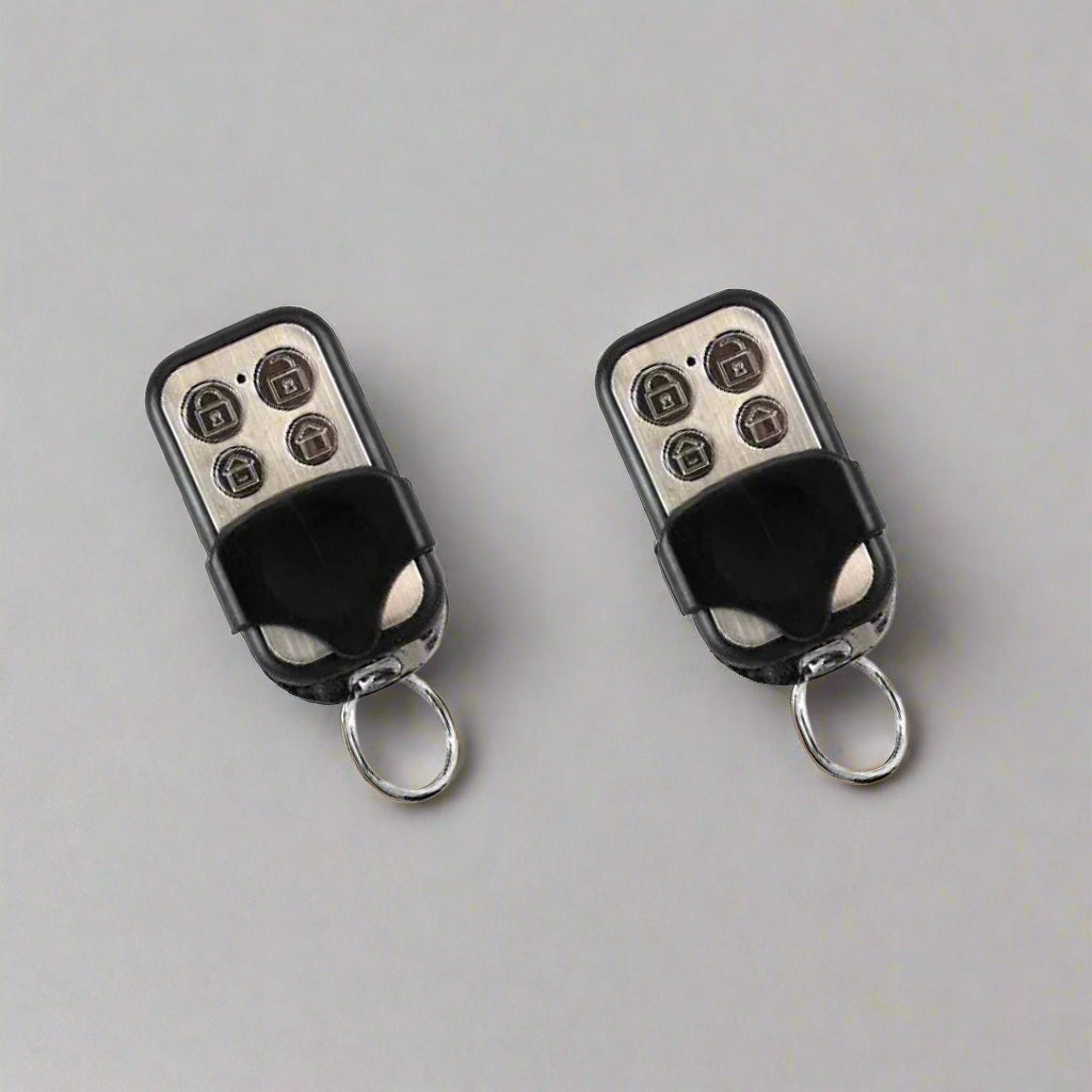 Front view of Activor RTI-01 4-button remote fob for Hills, Reliance, and NX alarms